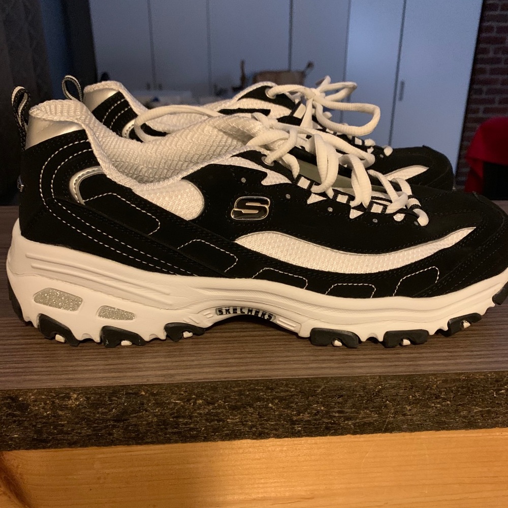 Sketchers sneakers. Worn once. Like new.